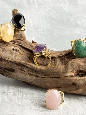 Gold-plated adjustable oval crystal ring by Elements by Nature, featuring a sparkling gemstone centerpiece. Faceted