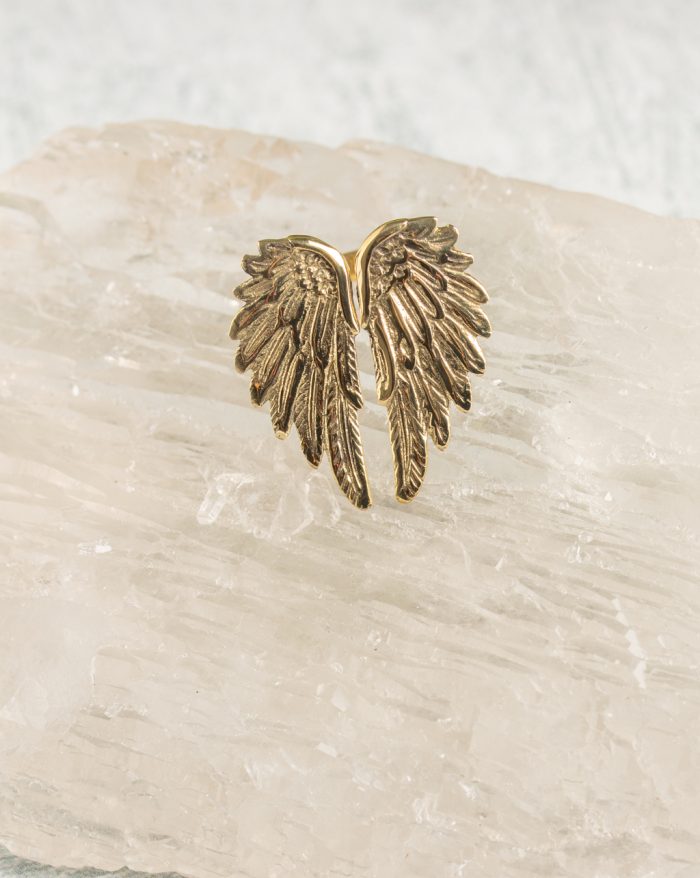 Adjustable silver and gold-plated feather ring, hand-carved with a symbolic feather design.