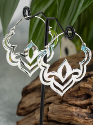 Handmade silver Bali lotus earrings with delicate symmetry, inspired by the beauty of the lotus flower and crafted by artisans.