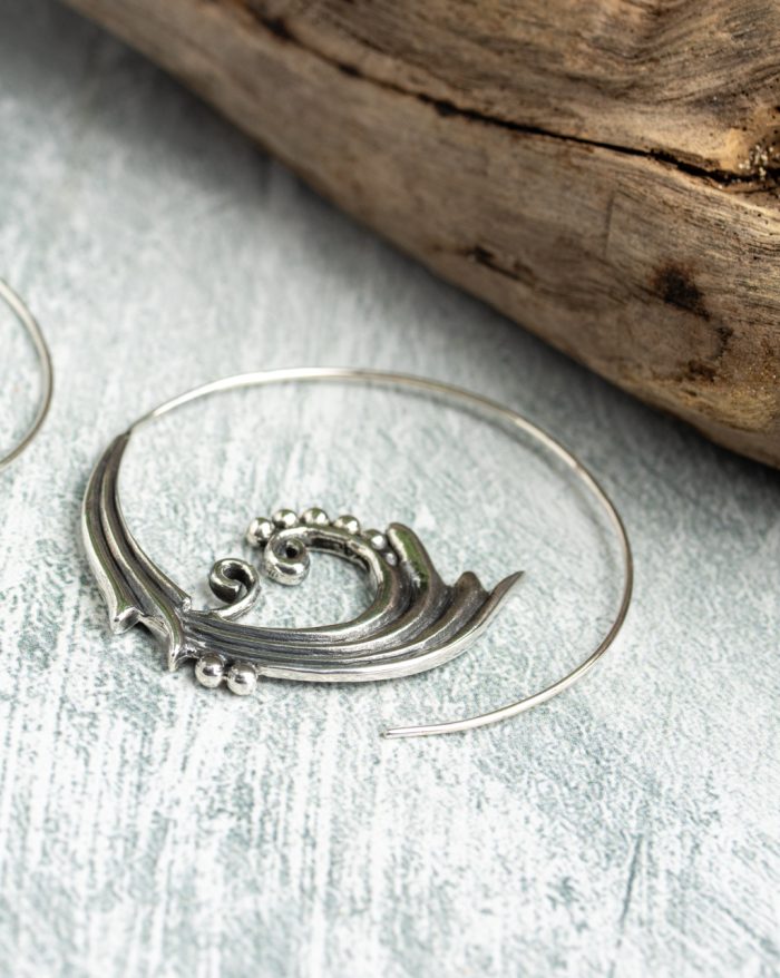 Handmade silver Bali hoop earrings with a bold round boho design, crafted by artisans.