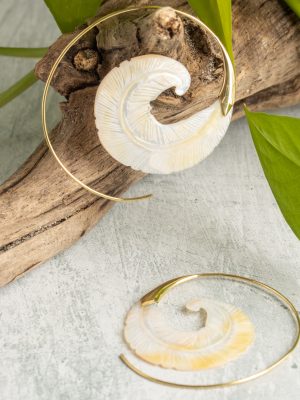 Hand-carved gold-plated feather earrings from the Bali collection, featuring bone and shell details, artisan handmade.