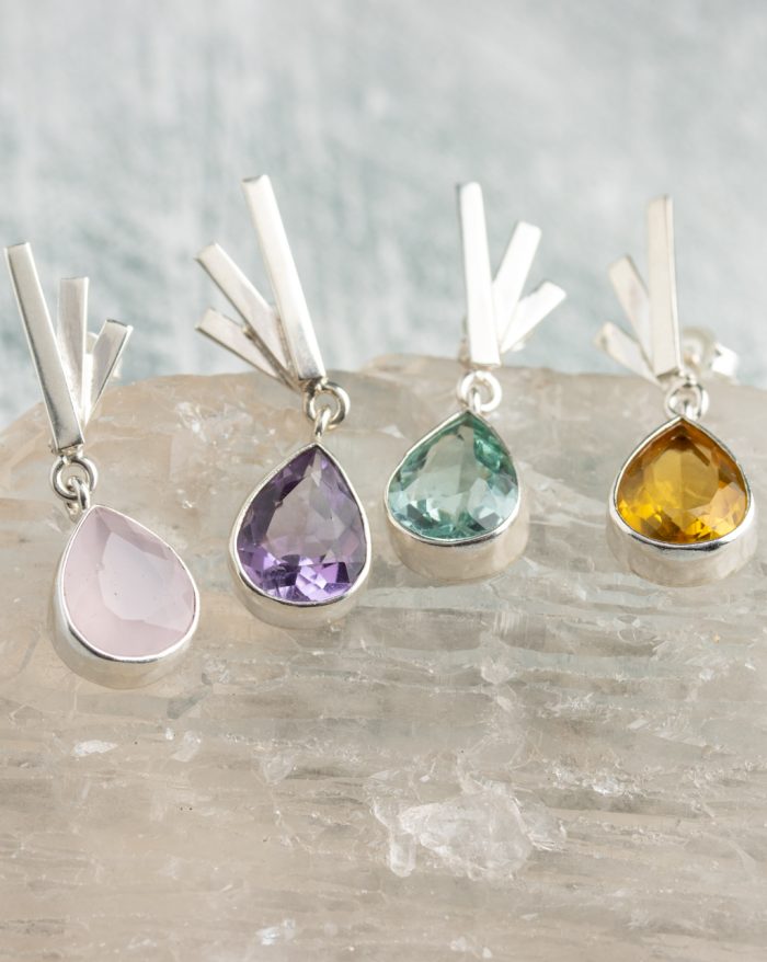 Handmade silver drop-shaped gemstone earrings crafted by artisans in Brazil, featuring fine jewellery design.