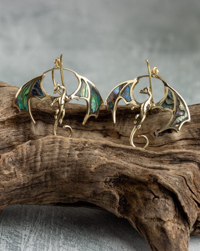 Handmade dragon earrings in silver or gold-plated finish, featuring shell-crafted details in the wings