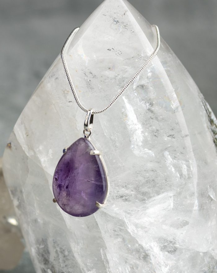 Handmade silver pendant with large teardrop-shaped gemstones, available in rose quartz, citrine, amethyst, obsidian, and aventurine variations.