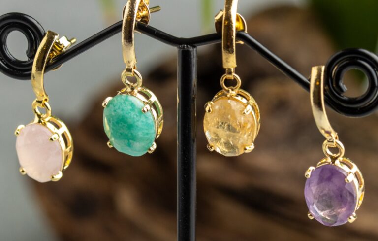 Four gold-set drop earrings with rose quartz, amazonite, citrine and amethyst stones