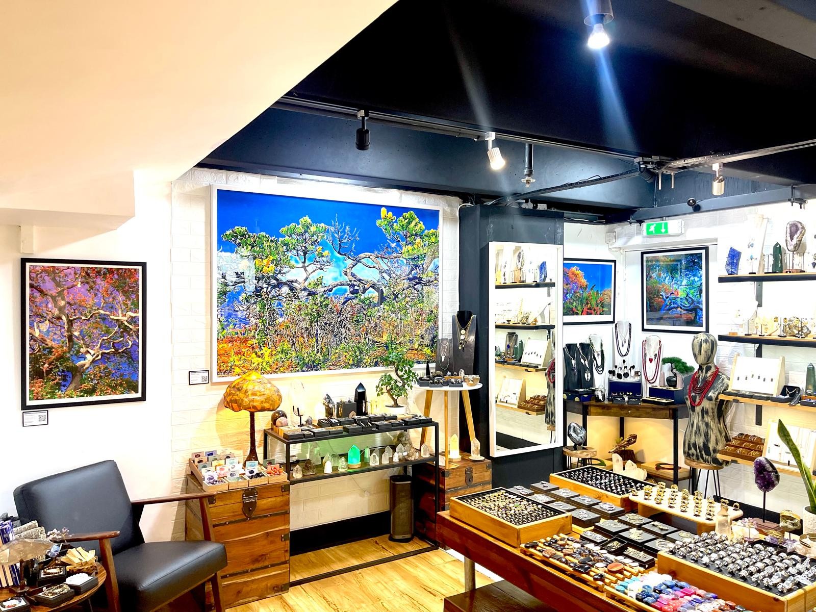 Inside the Elements by Nature shop in High Barnet: ring trays, crystals and handmade jewellery on wooden displays