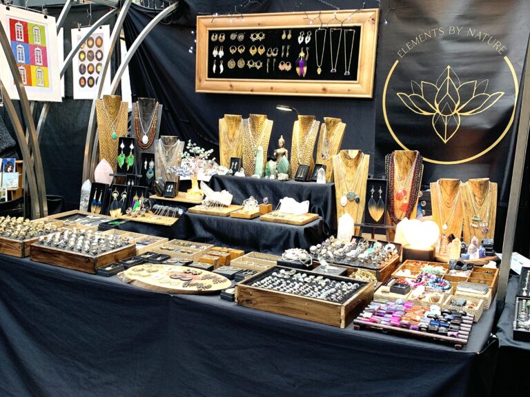 The Elements by Nature stall at Old Spitalfields Market: wooden busts, crystals and rings under the market roof
